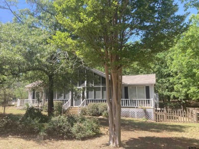 Priced below Wood CAD appraised value shows MOTIVATED seller who on Holly Lake Ranch Golf Club in Texas - for sale on GolfHomes.com, golf home, golf lot