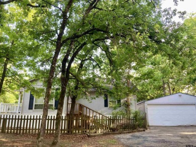 Priced below Wood CAD appraised value shows MOTIVATED seller who on Holly Lake Ranch Golf Club in Texas - for sale on GolfHomes.com, golf home, golf lot