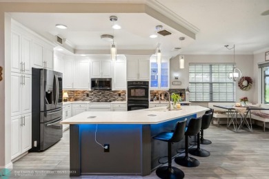 Welcome to your beautifully remodeled, one-level townhome! This on Parkland Golf Club in Florida - for sale on GolfHomes.com, golf home, golf lot
