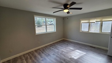 Located in the heart of Fairfield Bay, this well-maintained home on Indian Hills Country Club in Arkansas - for sale on GolfHomes.com, golf home, golf lot