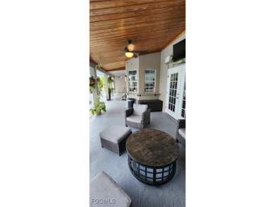Light, bright, and full of charm-this stunning pool home sits on on Palmetto-Pine Country Club in Florida - for sale on GolfHomes.com, golf home, golf lot