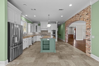 Waterfront Living in The Shores of Lake Caroline | 4 Bedrooms /3 on Lake Caroline Golf Club in Mississippi - for sale on GolfHomes.com, golf home, golf lot