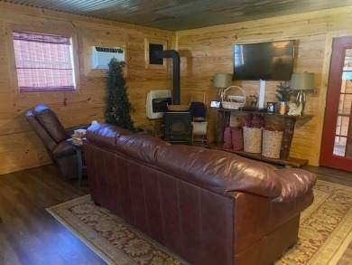 Outstanding view of a 80 plus acre private lake . Charming 3 bed on Clarksville Country Club in Texas - for sale on GolfHomes.com, golf home, golf lot