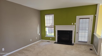 Located in the Country Club of the Poconos, 1712 Big Ridge Drive on Country Club of the Poconos Golf Course in Pennsylvania - for sale on GolfHomes.com, golf home, golf lot