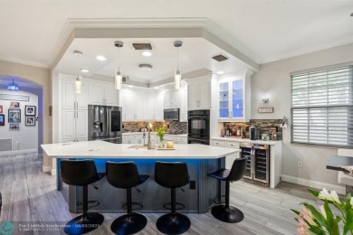 Welcome to your beautifully remodeled, one-level townhome! This on Parkland Golf Club in Florida - for sale on GolfHomes.com, golf home, golf lot