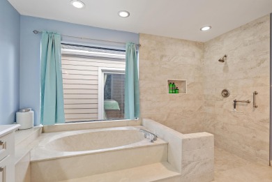 In the heart of Palm Beach Gardens this beautifully updated on Old Marsh Golf Club in Florida - for sale on GolfHomes.com, golf home, golf lot