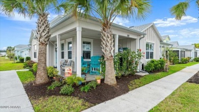 This beautifully appointed DREAMSICLE sits on a unique lot with on LPGA International Golf Course in Florida - for sale on GolfHomes.com, golf home, golf lot