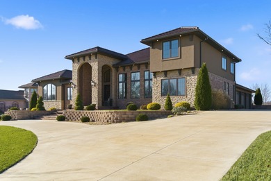 Experience refined living in this exceptional 5-bedroom, 3 on Highland Springs Country Club in Missouri - for sale on GolfHomes.com, golf home, golf lot