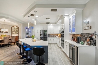 Welcome to your beautifully remodeled, one-level townhome! This on Parkland Golf Club in Florida - for sale on GolfHomes.com, golf home, golf lot