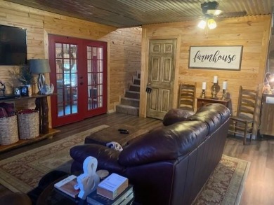 Outstanding view of a 80 plus acre private lake . Charming 3 bed on Clarksville Country Club in Texas - for sale on GolfHomes.com, golf home, golf lot