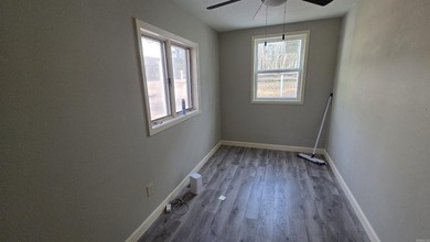 Located in the heart of Fairfield Bay, this well-maintained home on Indian Hills Country Club in Arkansas - for sale on GolfHomes.com, golf home, golf lot