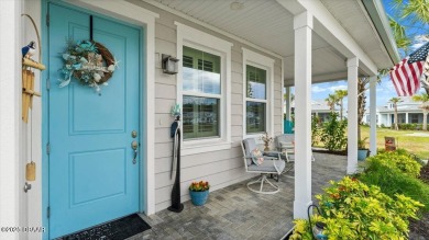 This beautifully appointed DREAMSICLE sits on a unique lot with on LPGA International Golf Course in Florida - for sale on GolfHomes.com, golf home, golf lot