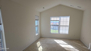 Located in the Country Club of the Poconos, 1712 Big Ridge Drive on Country Club of the Poconos Golf Course in Pennsylvania - for sale on GolfHomes.com, golf home, golf lot