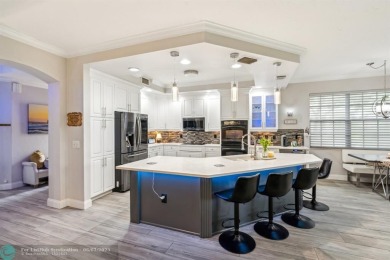 Welcome to your beautifully remodeled, one-level townhome! This on Parkland Golf Club in Florida - for sale on GolfHomes.com, golf home, golf lot