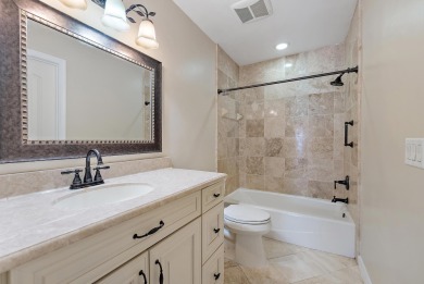 In the heart of Palm Beach Gardens this beautifully updated on Old Marsh Golf Club in Florida - for sale on GolfHomes.com, golf home, golf lot