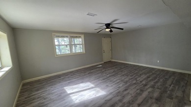 Located in the heart of Fairfield Bay, this well-maintained home on Indian Hills Country Club in Arkansas - for sale on GolfHomes.com, golf home, golf lot