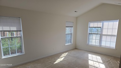 Located in the Country Club of the Poconos, 1712 Big Ridge Drive on Country Club of the Poconos Golf Course in Pennsylvania - for sale on GolfHomes.com, golf home, golf lot