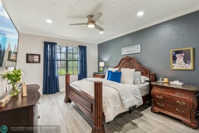 Welcome to your beautifully remodeled, one-level townhome! This on Parkland Golf Club in Florida - for sale on GolfHomes.com, golf home, golf lot