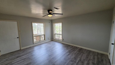 Located in the heart of Fairfield Bay, this well-maintained home on Indian Hills Country Club in Arkansas - for sale on GolfHomes.com, golf home, golf lot