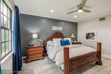 Welcome to your beautifully remodeled, one-level townhome! This on Parkland Golf Club in Florida - for sale on GolfHomes.com, golf home, golf lot