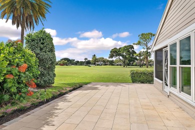 In the heart of Palm Beach Gardens this beautifully updated on Old Marsh Golf Club in Florida - for sale on GolfHomes.com, golf home, golf lot