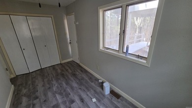 Located in the heart of Fairfield Bay, this well-maintained home on Indian Hills Country Club in Arkansas - for sale on GolfHomes.com, golf home, golf lot