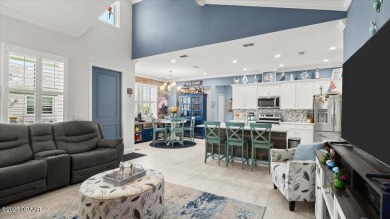 This beautifully appointed DREAMSICLE sits on a unique lot with on LPGA International Golf Course in Florida - for sale on GolfHomes.com, golf home, golf lot