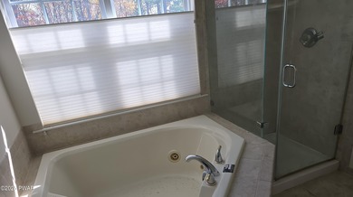 Located in the Country Club of the Poconos, 1712 Big Ridge Drive on Country Club of the Poconos Golf Course in Pennsylvania - for sale on GolfHomes.com, golf home, golf lot