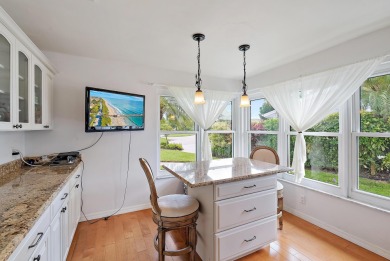 In the heart of Palm Beach Gardens this beautifully updated on Old Marsh Golf Club in Florida - for sale on GolfHomes.com, golf home, golf lot