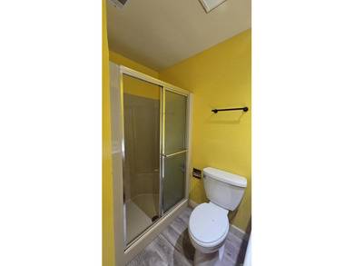 Located in the heart of Fairfield Bay, this well-maintained home on Indian Hills Country Club in Arkansas - for sale on GolfHomes.com, golf home, golf lot