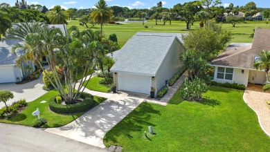 In the heart of Palm Beach Gardens this beautifully updated on Old Marsh Golf Club in Florida - for sale on GolfHomes.com, golf home, golf lot