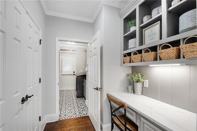 Experience refined luxury living on the golf course in the on Laurel Springs Golf Club in Georgia - for sale on GolfHomes.com, golf home, golf lot