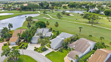 In the heart of Palm Beach Gardens this beautifully updated on Old Marsh Golf Club in Florida - for sale on GolfHomes.com, golf home, golf lot