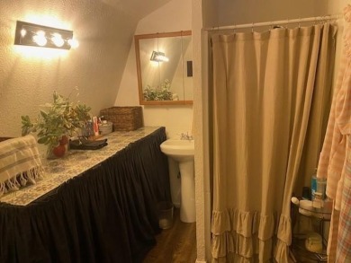 Outstanding view of a 80 plus acre private lake . Charming 3 bed on Clarksville Country Club in Texas - for sale on GolfHomes.com, golf home, golf lot