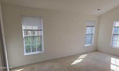 Located in the Country Club of the Poconos, 1712 Big Ridge Drive on Country Club of the Poconos Golf Course in Pennsylvania - for sale on GolfHomes.com, golf home, golf lot