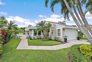In the heart of Palm Beach Gardens this beautifully updated on Old Marsh Golf Club in Florida - for sale on GolfHomes.com, golf home, golf lot