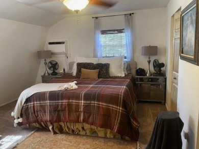 Outstanding view of a 80 plus acre private lake . Charming 3 bed on Clarksville Country Club in Texas - for sale on GolfHomes.com, golf home, golf lot