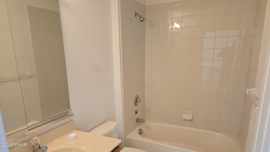 Located in the Country Club of the Poconos, 1712 Big Ridge Drive on Country Club of the Poconos Golf Course in Pennsylvania - for sale on GolfHomes.com, golf home, golf lot