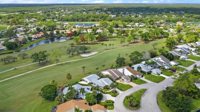 In the heart of Palm Beach Gardens this beautifully updated on Old Marsh Golf Club in Florida - for sale on GolfHomes.com, golf home, golf lot