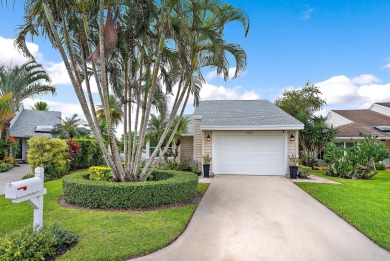 In the heart of Palm Beach Gardens this beautifully updated on Old Marsh Golf Club in Florida - for sale on GolfHomes.com, golf home, golf lot