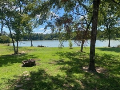 Outstanding view of a 80 plus acre private lake . Charming 3 bed on Clarksville Country Club in Texas - for sale on GolfHomes.com, golf home, golf lot