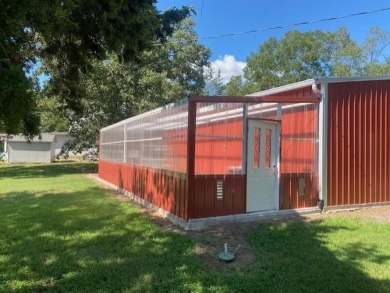 Outstanding view of a 80 plus acre private lake . Charming 3 bed on Clarksville Country Club in Texas - for sale on GolfHomes.com, golf home, golf lot