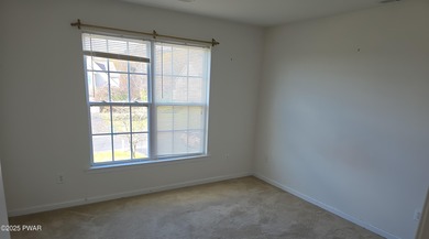 Located in the Country Club of the Poconos, 1712 Big Ridge Drive on Country Club of the Poconos Golf Course in Pennsylvania - for sale on GolfHomes.com, golf home, golf lot