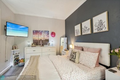 Welcome to your beautifully remodeled, one-level townhome! This on Parkland Golf Club in Florida - for sale on GolfHomes.com, golf home, golf lot