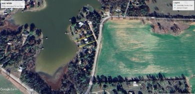 Outstanding view of a 80 plus acre private lake . Charming 3 bed on Clarksville Country Club in Texas - for sale on GolfHomes.com, golf home, golf lot