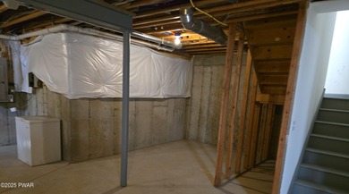 Located in the Country Club of the Poconos, 1712 Big Ridge Drive on Country Club of the Poconos Golf Course in Pennsylvania - for sale on GolfHomes.com, golf home, golf lot