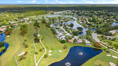 In the heart of Palm Beach Gardens this beautifully updated on Old Marsh Golf Club in Florida - for sale on GolfHomes.com, golf home, golf lot