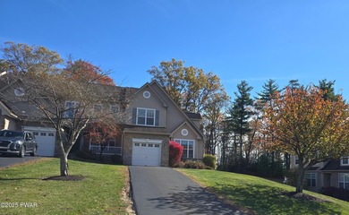 Located in the Country Club of the Poconos, 1712 Big Ridge Drive on Country Club of the Poconos Golf Course in Pennsylvania - for sale on GolfHomes.com, golf home, golf lot