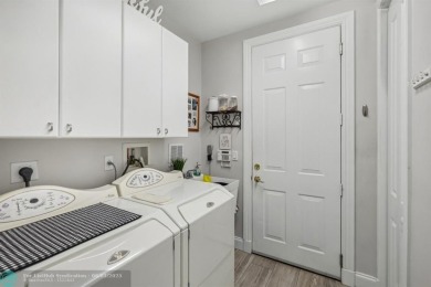Welcome to your beautifully remodeled, one-level townhome! This on Parkland Golf Club in Florida - for sale on GolfHomes.com, golf home, golf lot