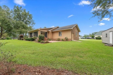 Welcome to this charming 3-bedroom, 2-bath ranch-style home on Santee-Cooper Country Club in South Carolina - for sale on GolfHomes.com, golf home, golf lot